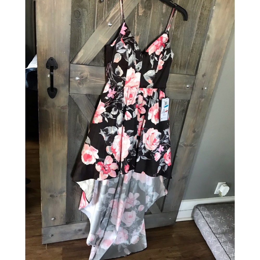 Brand new. NWT. High low dress